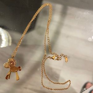 Rose gold color necklace with horse pedant